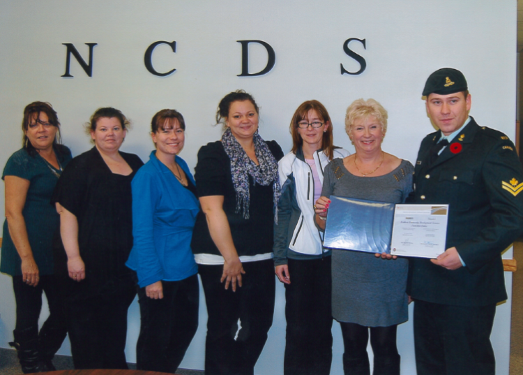 NCDS accepting award from Canadian Armed Forces', Nathan Cousineau